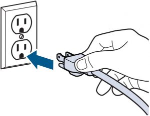 Plugging the power cord into an outlet
