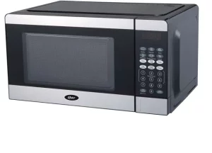Oster 0.7cu. ft. Countertop Microwave Manual Image